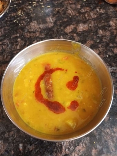 Delicious Dal Tadka prepared by COOX