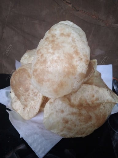 Delicious Bhature prepared by COOX