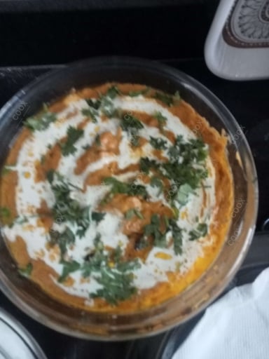 Delicious Butter Chicken prepared by COOX