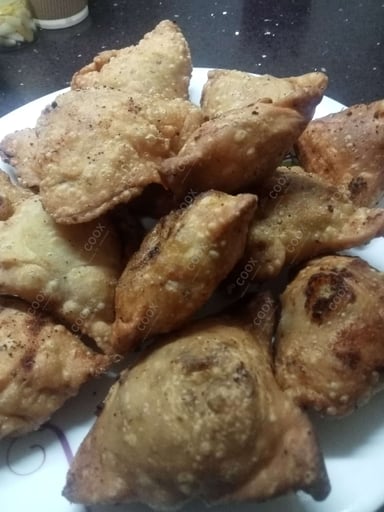 Delicious Mini Samosas prepared by COOX