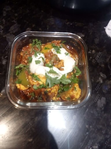 Delicious Kadhai Paneer prepared by COOX