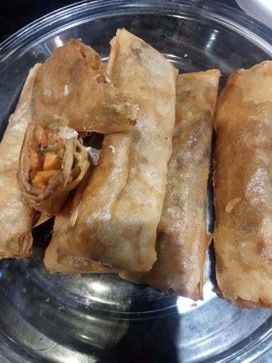 Delicious Veg Spring Rolls prepared by COOX