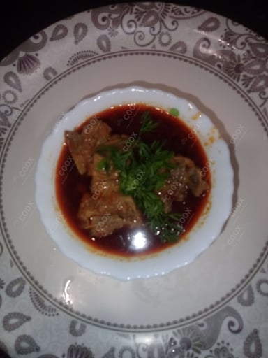 Delicious Mutton Rogan Josh prepared by COOX