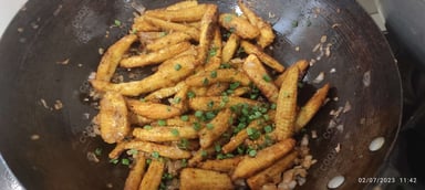 Tasty Crispy Chilli Baby Corn cooked by COOX chefs cooks during occasions parties events at home