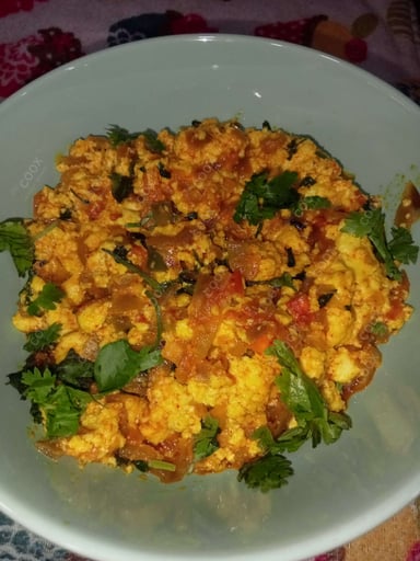Tasty Paneer Bhurji cooked by COOX chefs cooks during occasions parties events at home