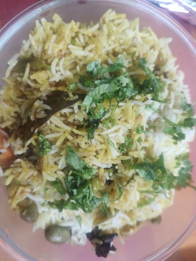 Delicious Veg Biryani prepared by COOX