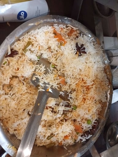 Delicious Veg Biryani prepared by COOX