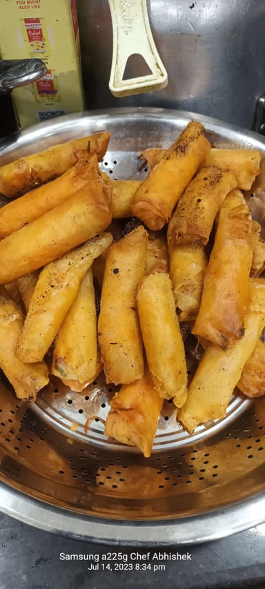 Delicious Veg Spring Rolls prepared by COOX