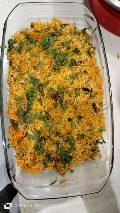 Delicious Veg Biryani prepared by COOX