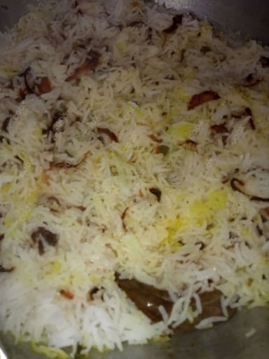 Delicious Veg Biryani prepared by COOX