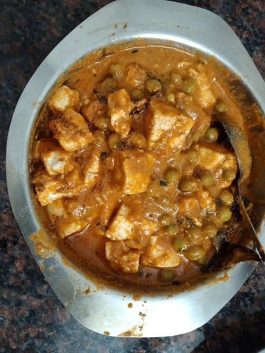 Delicious Matar Paneer prepared by COOX