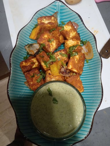 Delicious Paneer Tikka prepared by COOX