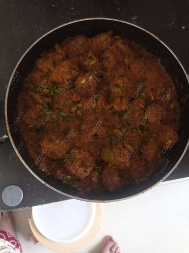 Delicious Veg Manchurian (Gravy) prepared by COOX