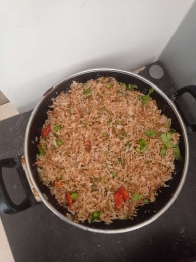 Delicious Veg Fried Rice prepared by COOX