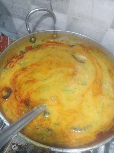 Delicious Dal Tadka prepared by COOX