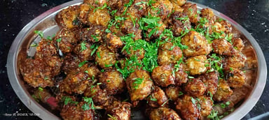 Delicious Veg Manchurian (Dry) prepared by COOX