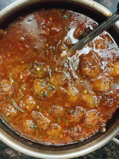 Delicious Veg Manchurian (Gravy) prepared by COOX