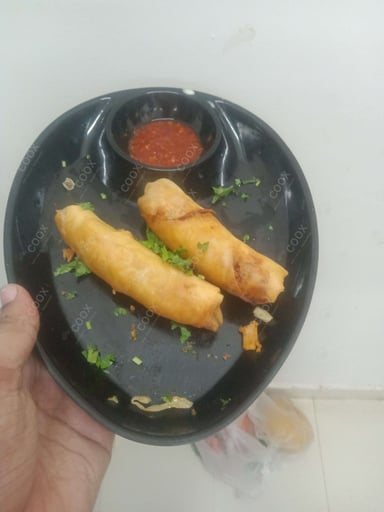 Delicious Veg Spring Rolls prepared by COOX