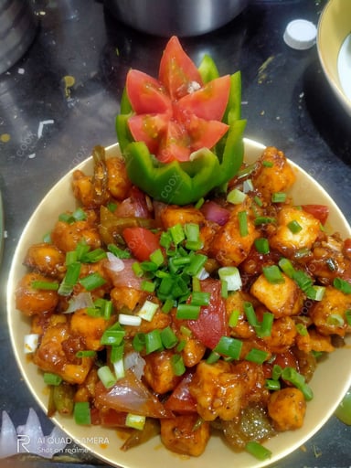 Delicious Chilly Paneer (Dry) prepared by COOX