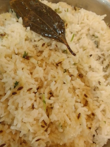 Delicious Jeera Rice prepared by COOX