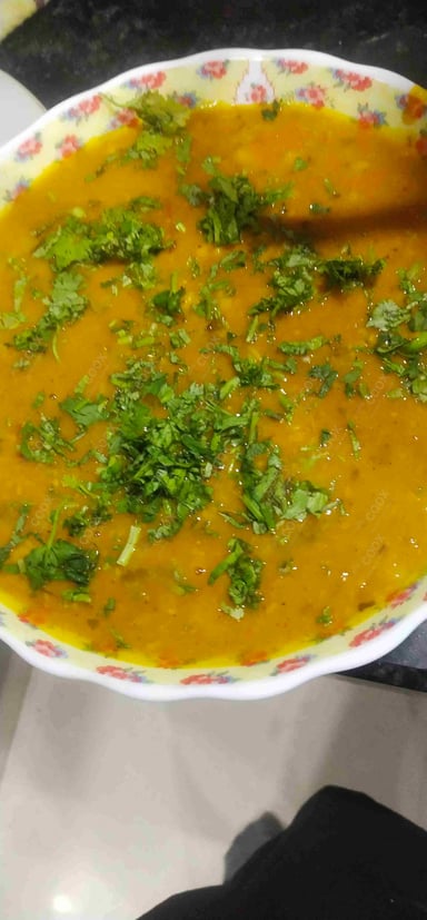 Tasty Chana Dal cooked by COOX chefs cooks during occasions parties events at home