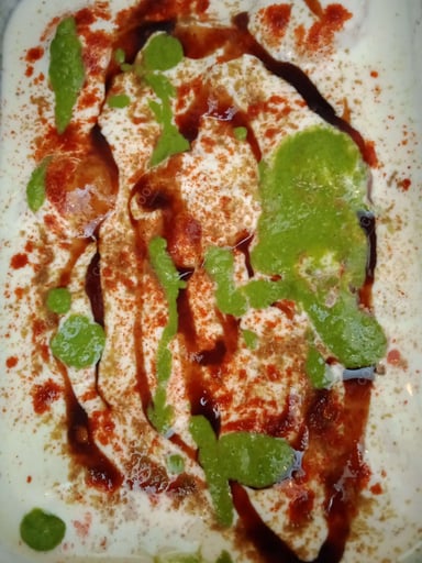 Delicious Dahi Bhalla prepared by COOX