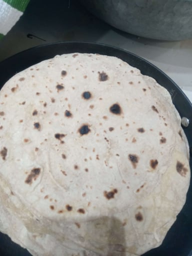 Delicious Tawa Rotis prepared by COOX