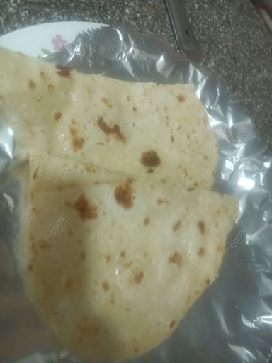 Delicious Naan (Butter / Garlic) prepared by COOX