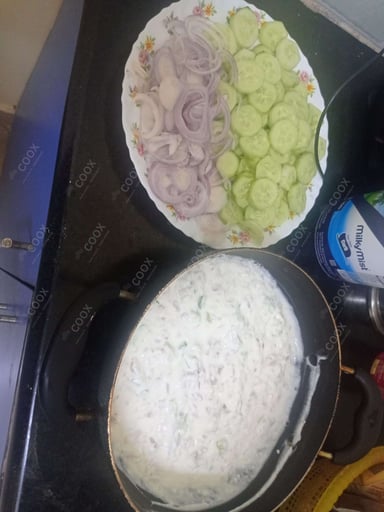 Tasty Plain Raita cooked by COOX chefs cooks during occasions parties events at home
