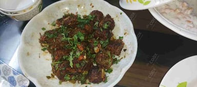 Delicious Veg Manchurian (Dry) prepared by COOX