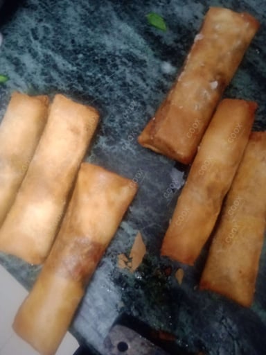 Delicious Veg Spring Rolls prepared by COOX