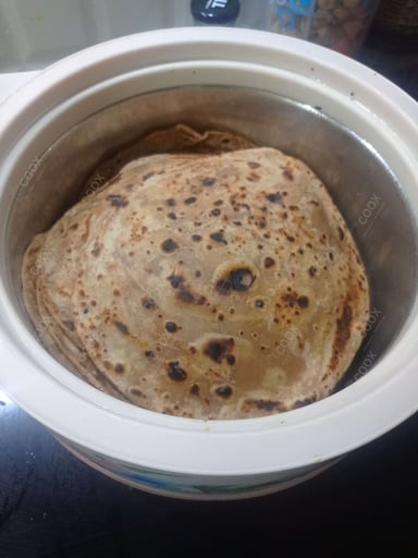 Delicious Lachha Parathas prepared by COOX