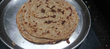 Delicious Lachha Parathas prepared by COOX