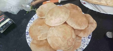 Delicious Tawa Rotis prepared by COOX