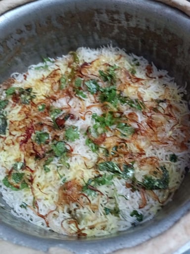 Delicious Veg Biryani prepared by COOX