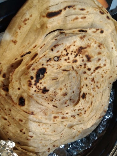 Delicious Lachha Parathas prepared by COOX