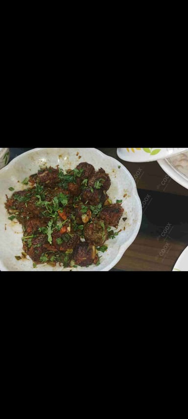 Delicious Veg Manchurian (Gravy) prepared by COOX