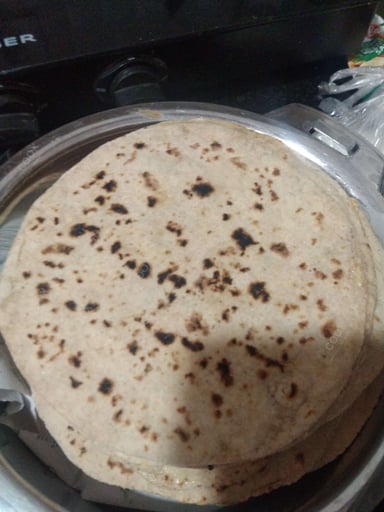 Delicious Tawa Rotis prepared by COOX