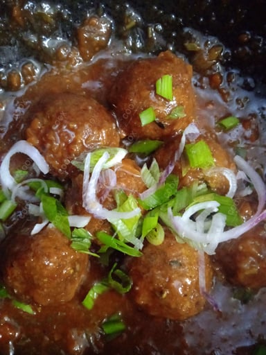 Delicious Veg Manchurian (Dry) prepared by COOX