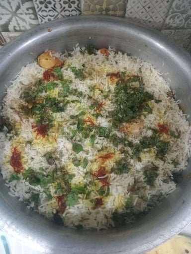 Delicious Veg Biryani prepared by COOX