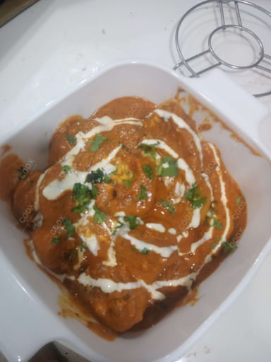 Delicious Stuffed Potatoes (Gravy) prepared by COOX