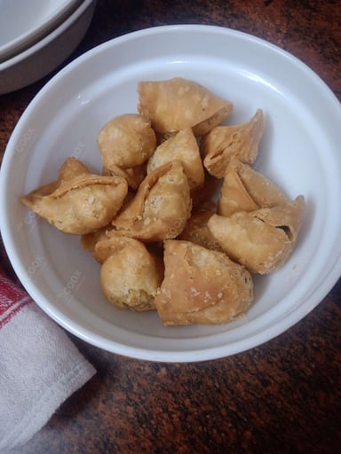 Delicious Mini Samosas prepared by COOX