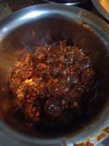 Delicious Veg Manchurian (Dry) prepared by COOX