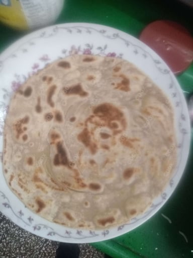 Delicious Lachha Parathas prepared by COOX