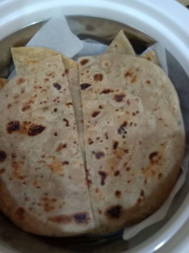 Delicious Lachha Parathas prepared by COOX