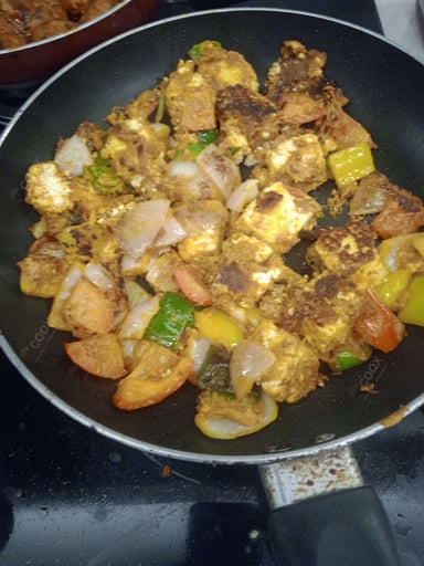 Delicious Paneer Tikka prepared by COOX