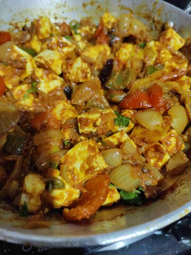 Delicious Kadhai Paneer prepared by COOX