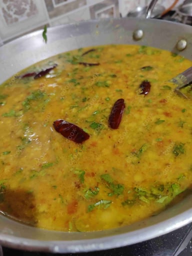 Delicious Dal Tadka prepared by COOX