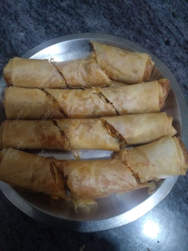 Delicious Veg Spring Rolls prepared by COOX