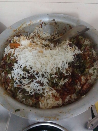 Delicious Veg Biryani prepared by COOX